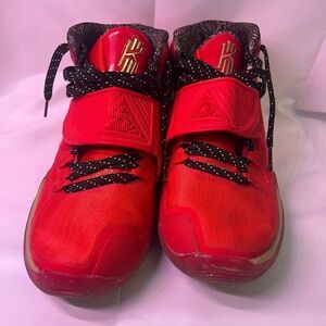 Nike Red Kyrie Basketball Sneakers with Black & Gold Accents
